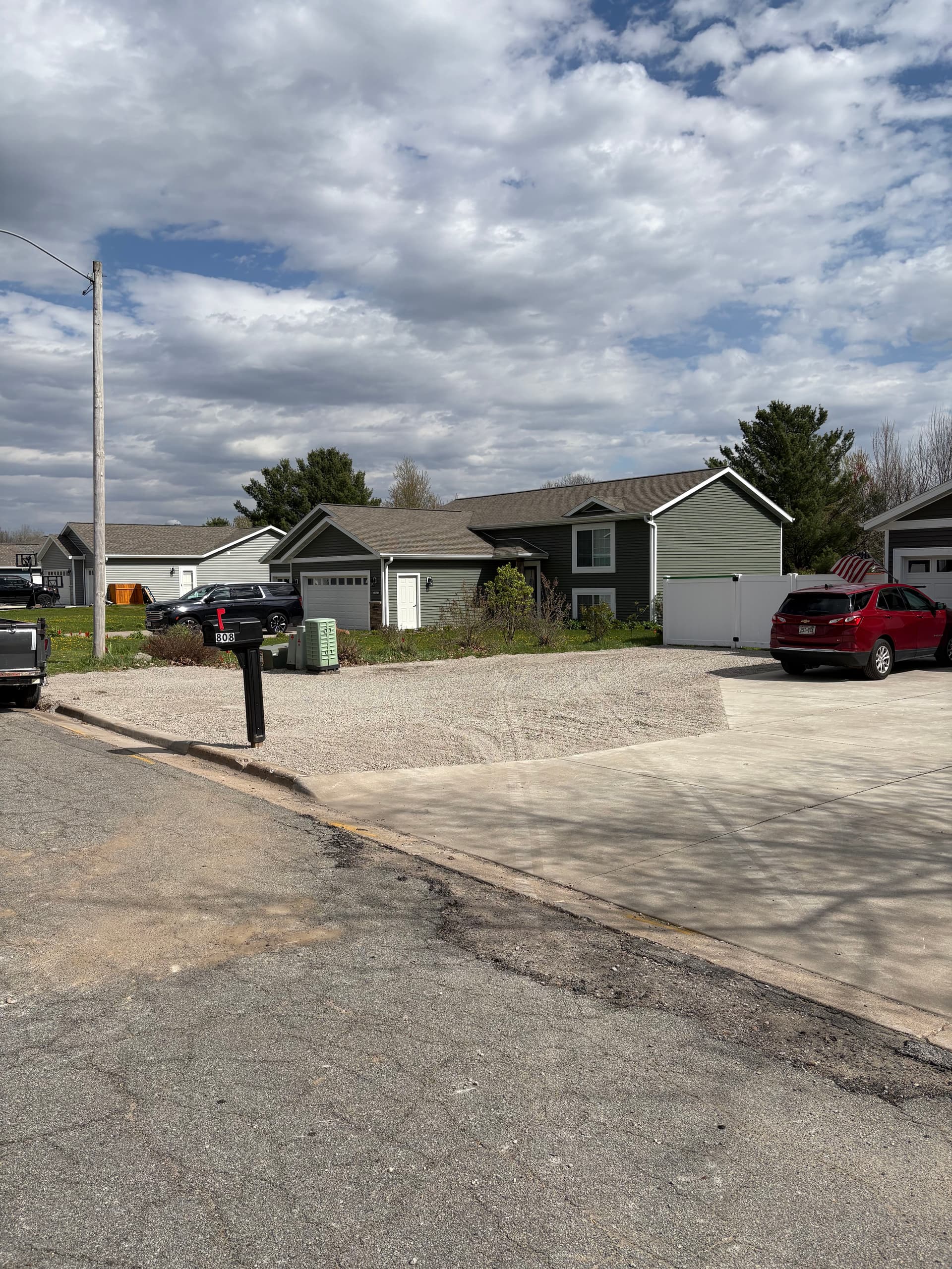 Gallery photos for Lawn Turned Into Low-Maintenance Parking Area With Road Base: Image #1