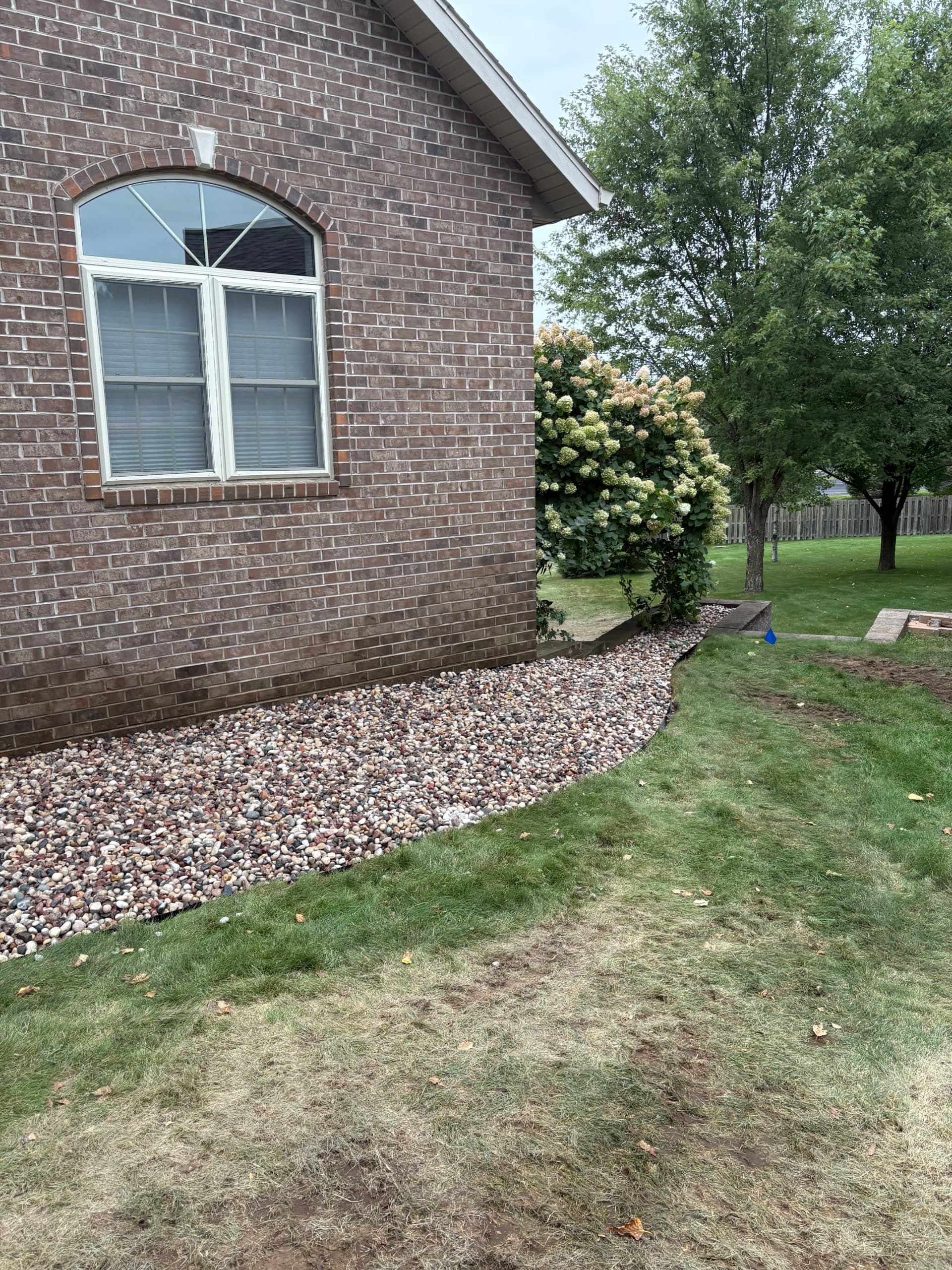 Gallery photos for Overgrown Landscape Beds Cleaned Up with Low-Maintenance Rock: Image #2