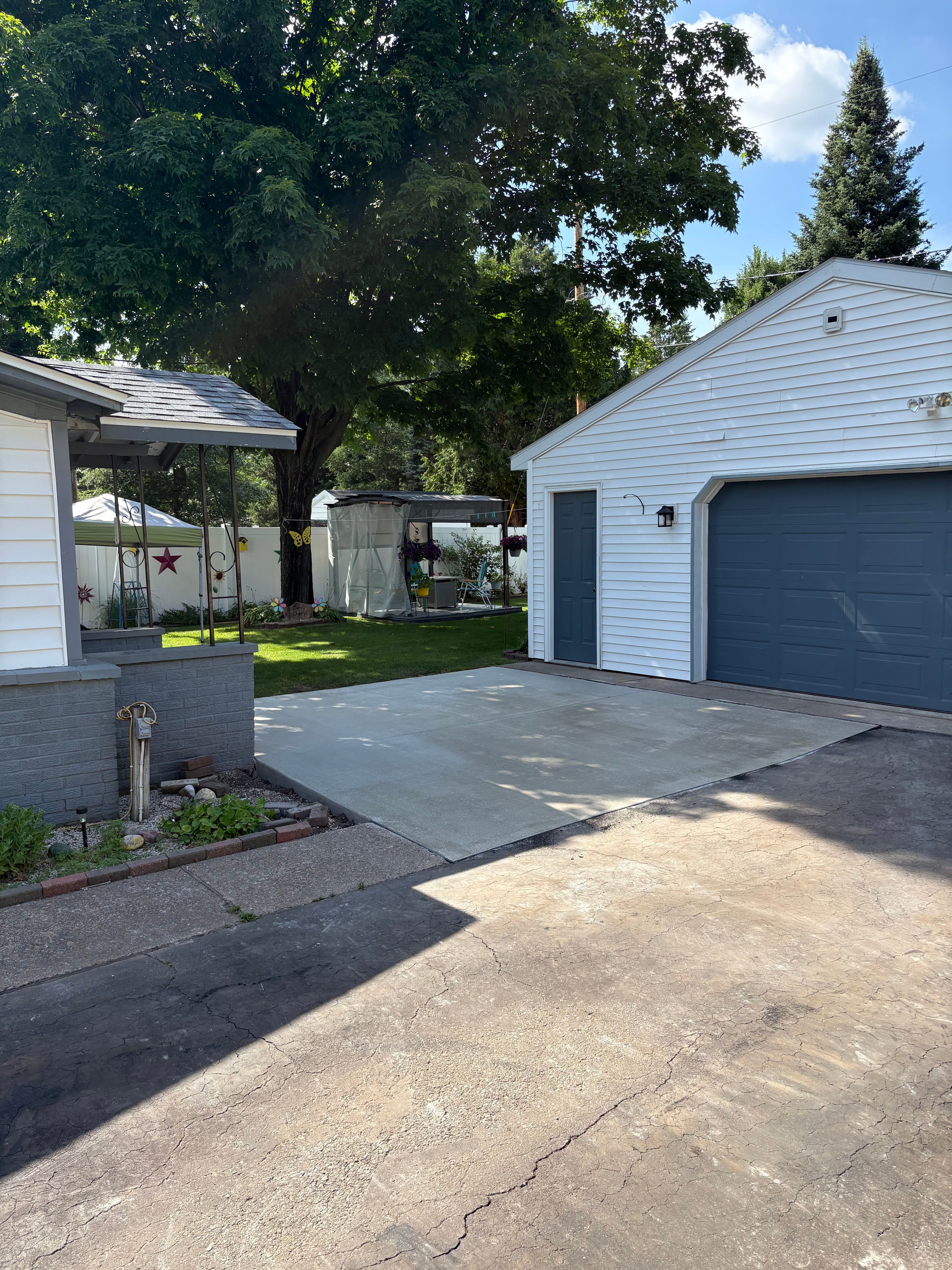 Project Brick Walkway and Blacktop Replaced With Fresh Concrete Flatwork image