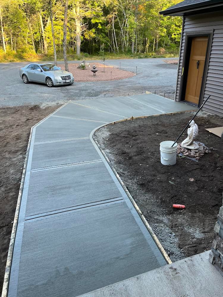 Project Stunning New Concrete Walkway for an Elegant Home Entrance image