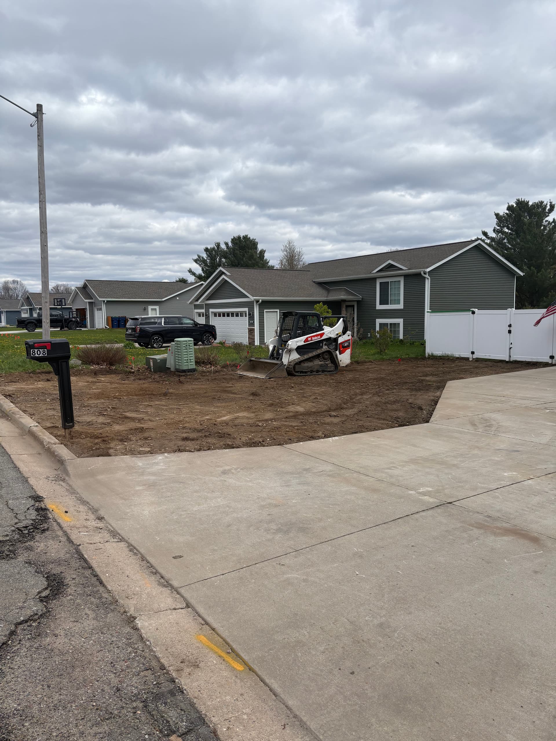 Gallery photos for Lawn Turned Into Low-Maintenance Parking Area With Road Base: Image #3