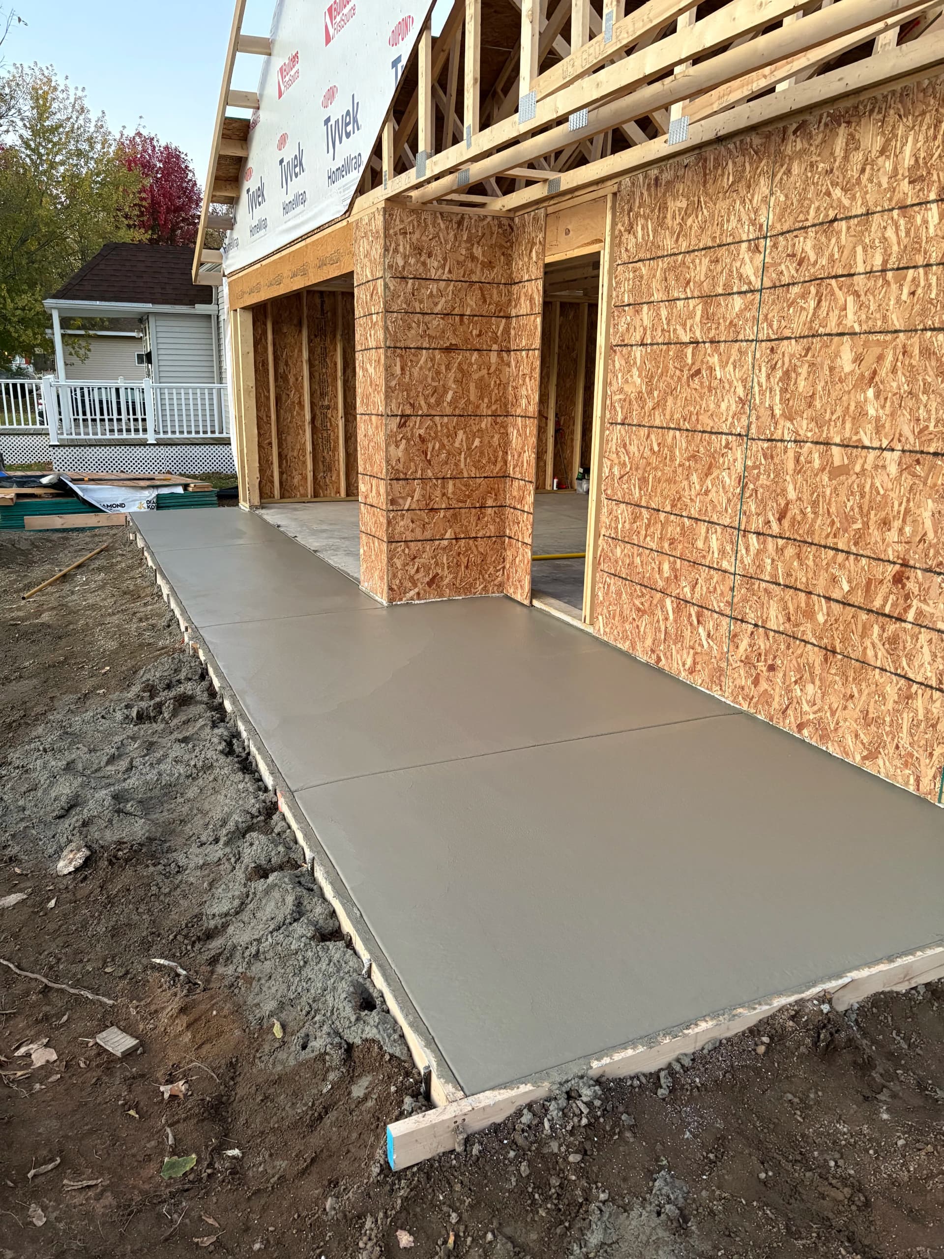 New Build Patio and Garage Approach Concrete Flatwork Done Right image
