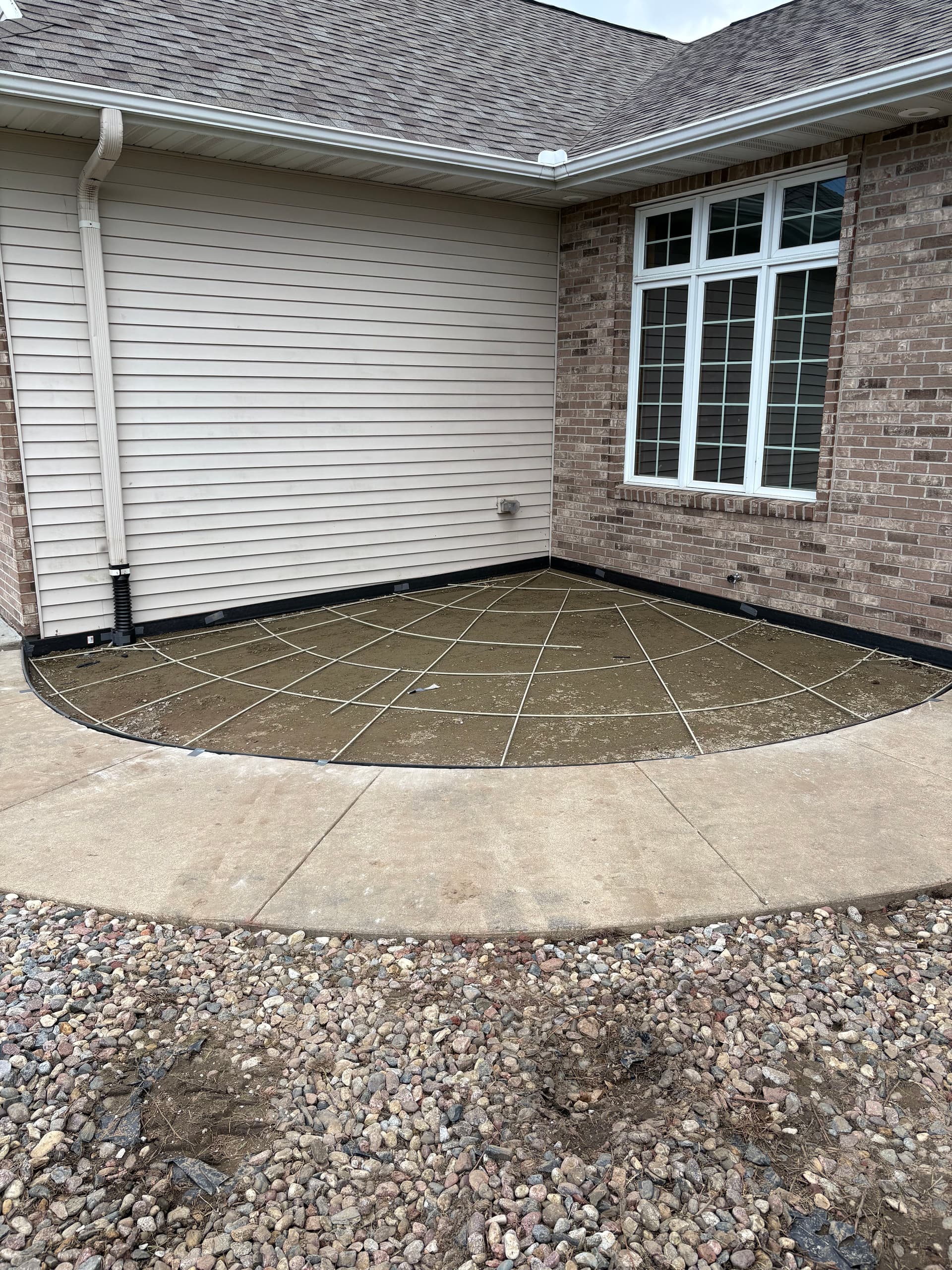 Gallery photos for Concrete Flatwork Solves a Garage Water Drainage Problem: Image #2