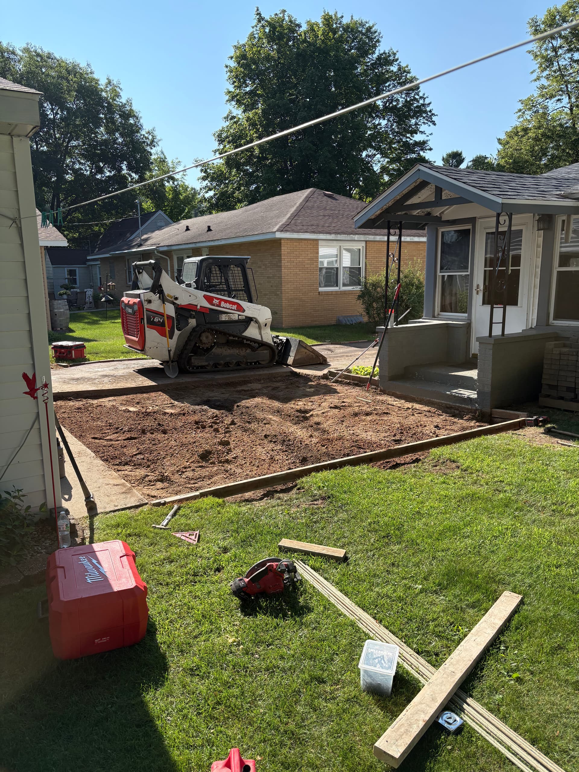 Gallery photos for Brick Walkway and Blacktop Replaced With Fresh Concrete Flatwork: Image #1