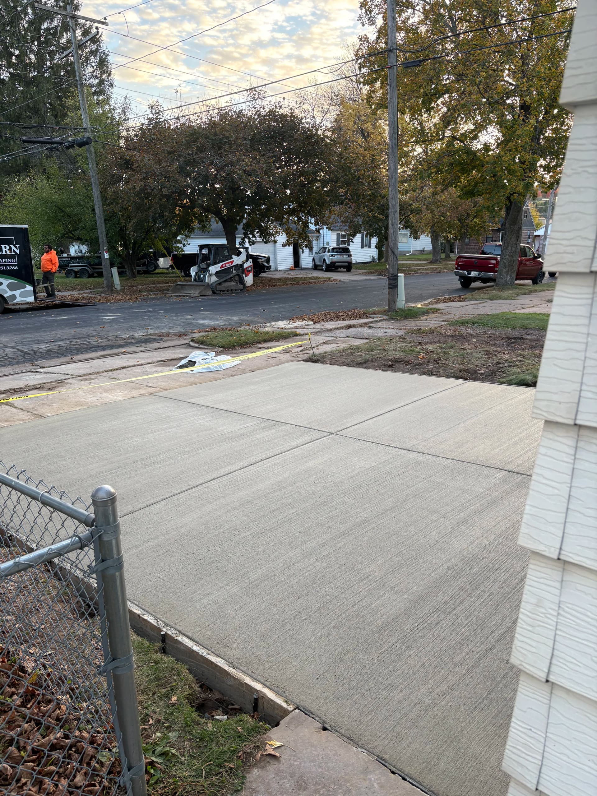 Gallery photos for Crumbling Garage Approach Gets a Fresh Concrete Driveway Replacement: Image #2