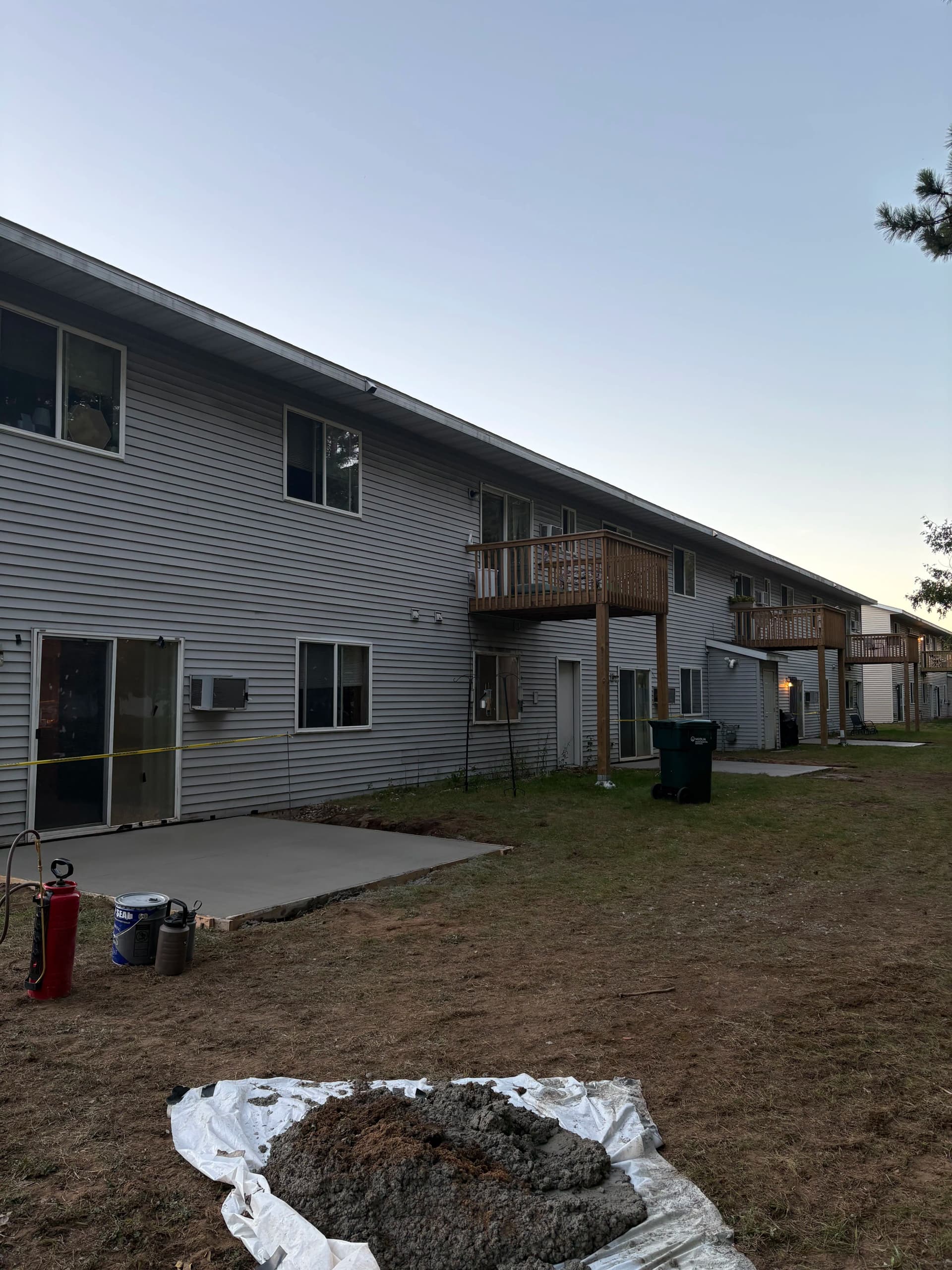 Gallery photos for New Concrete Patio Pads for Plover Apartment Units: Image #2