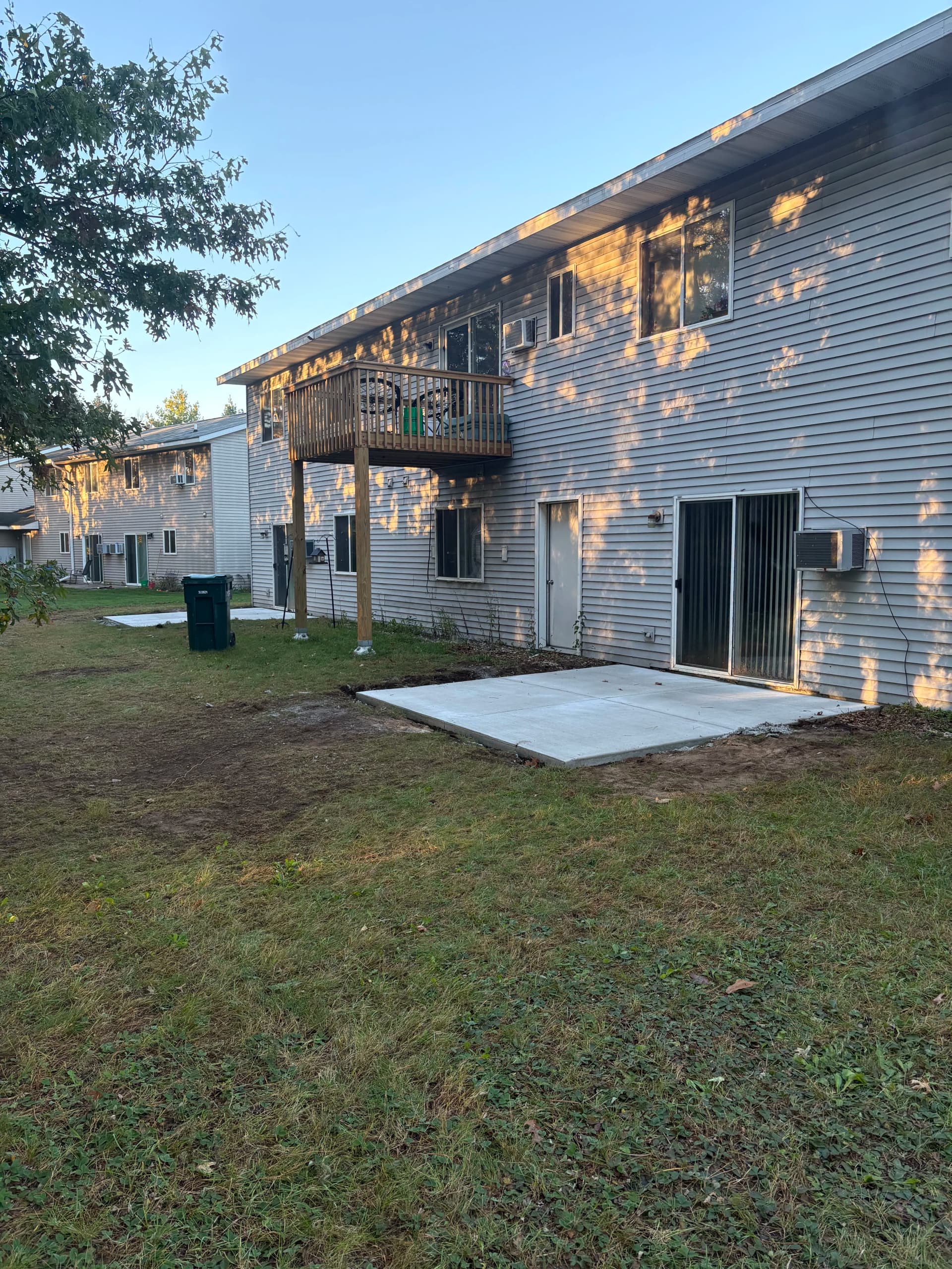 New Concrete Patio Pads for Plover Apartment Units image