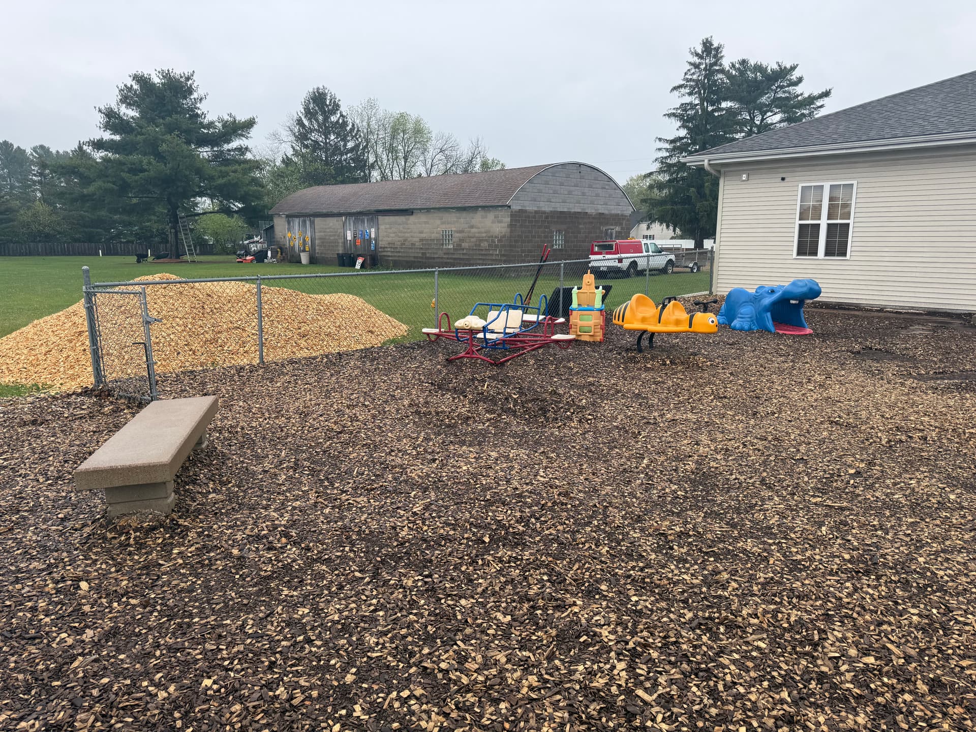 Playground Wood Chip Refresh at Story Book Kids Daycare image