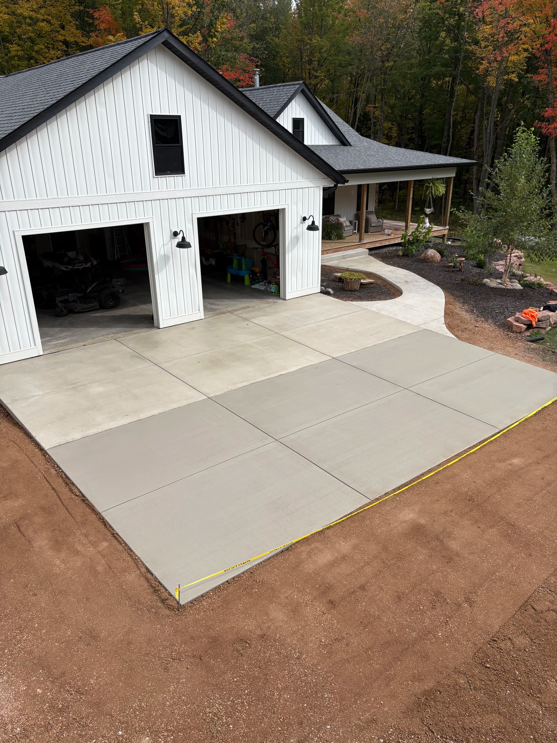 New Front Step, Sidewalk, and Garage Approach Poured Clean image