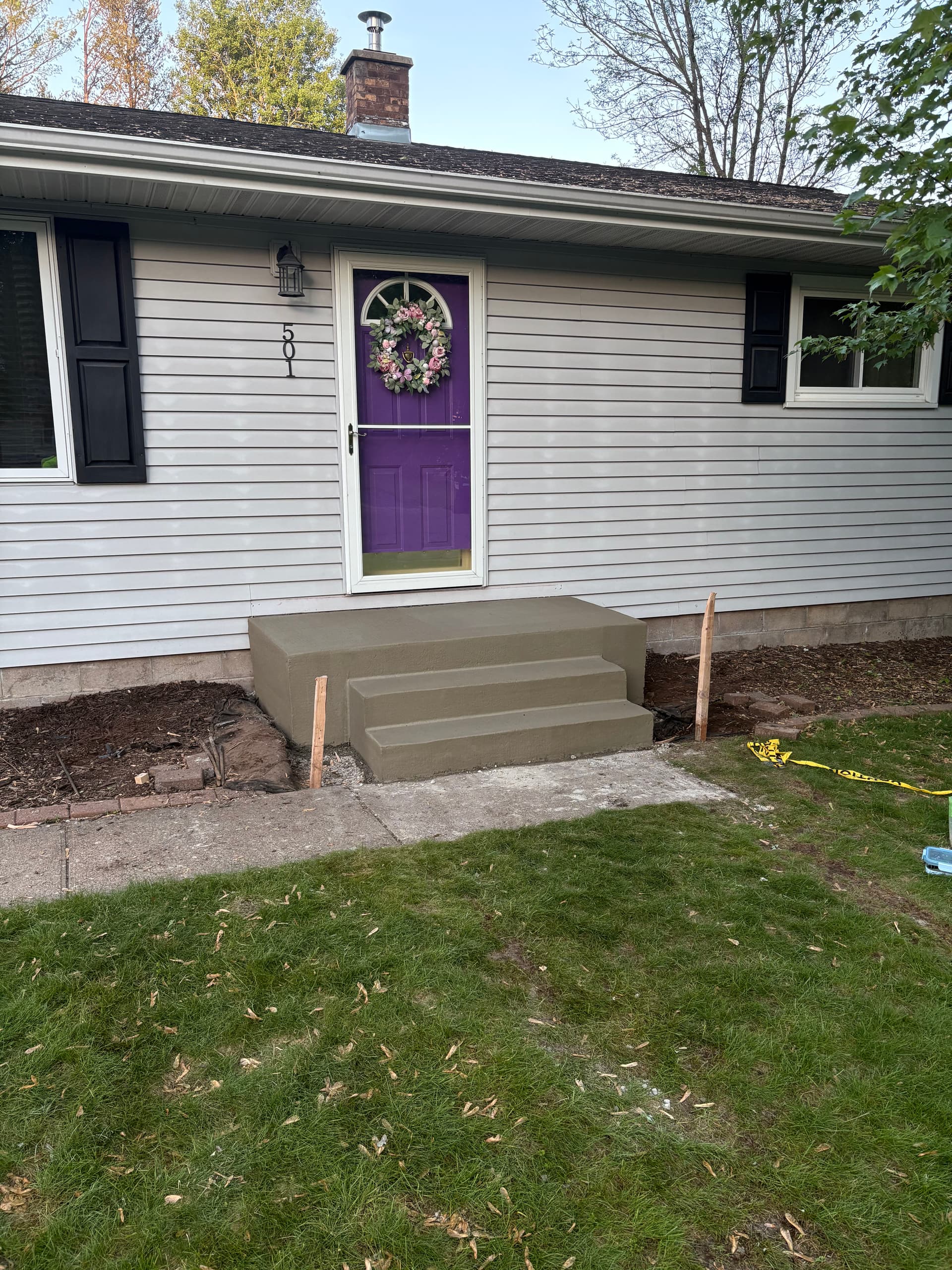 Gallery photos for Old Precast Steps Out, Fresh Poured Concrete Entry In: Image #1