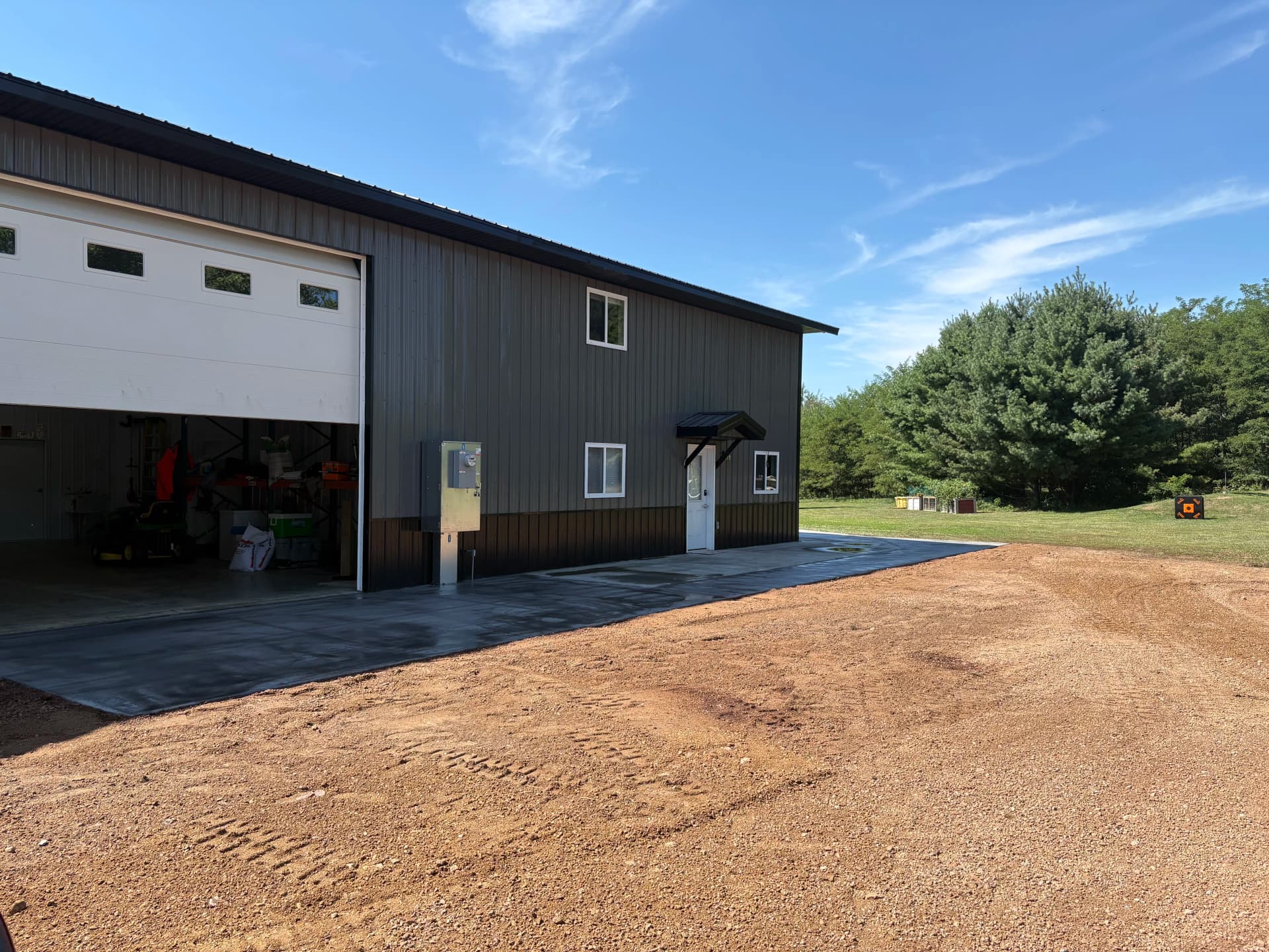 Gallery photos for Patio Extension, Garage Approach, and Slab Work at a Shop Property: Image #1