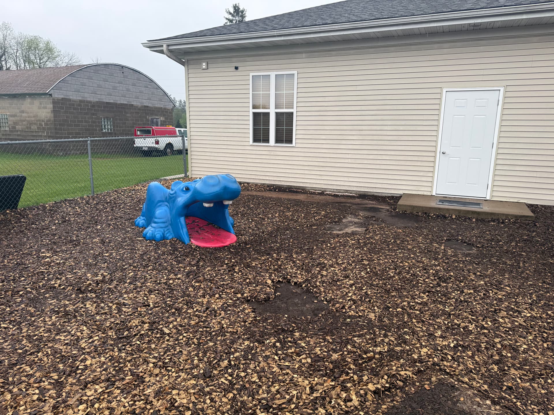 Gallery photos for Playground Wood Chip Refresh at Story Book Kids Daycare: Image #2