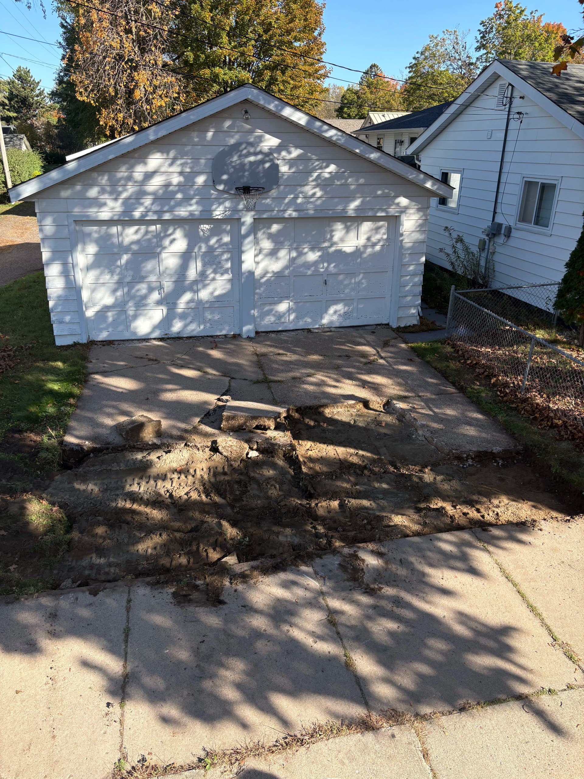 Gallery photos for Crumbling Garage Approach Gets a Fresh Concrete Driveway Replacement: Image #5