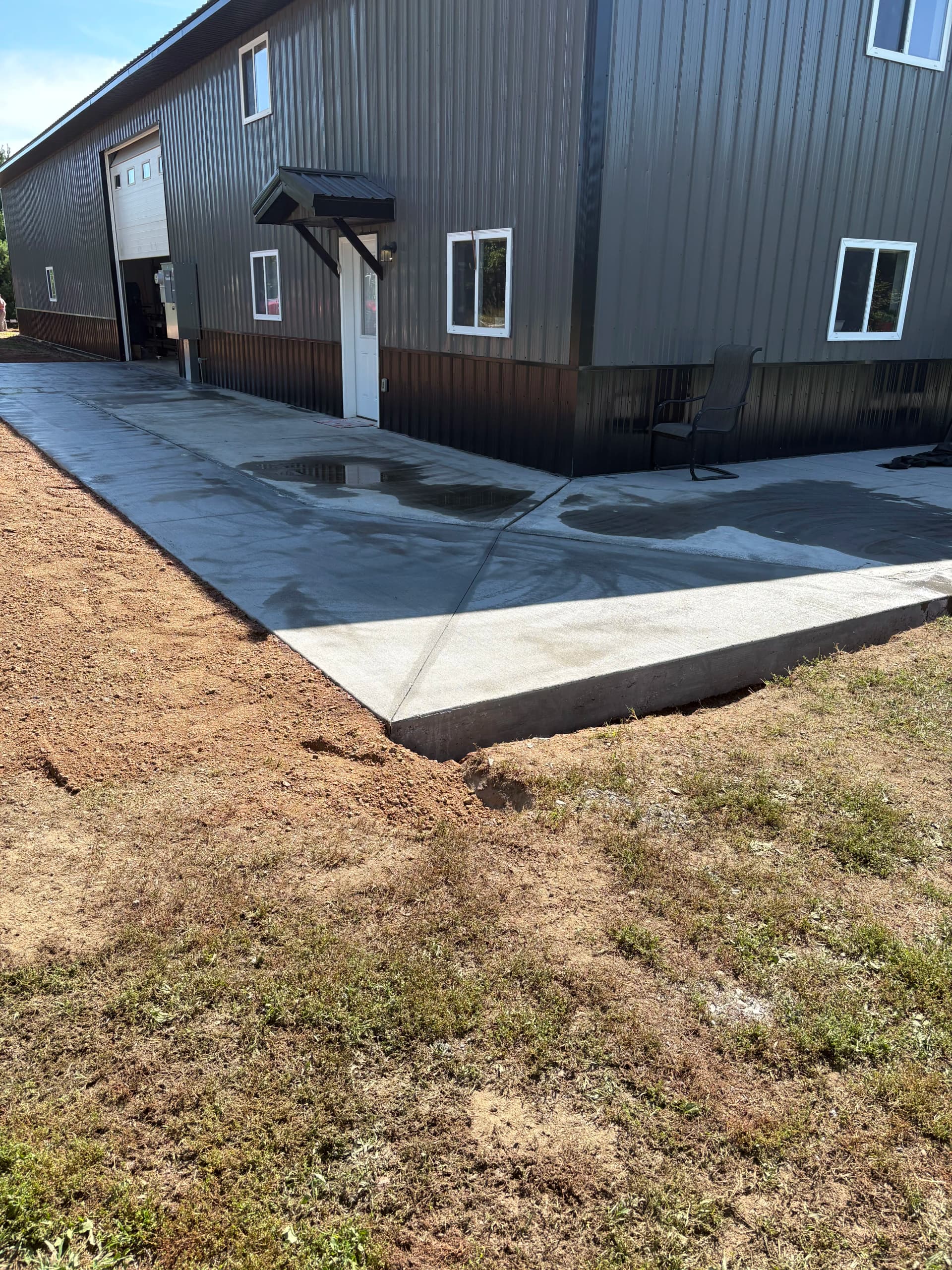 Patio Extension, Garage Approach, and Slab Work at a Shop Property image