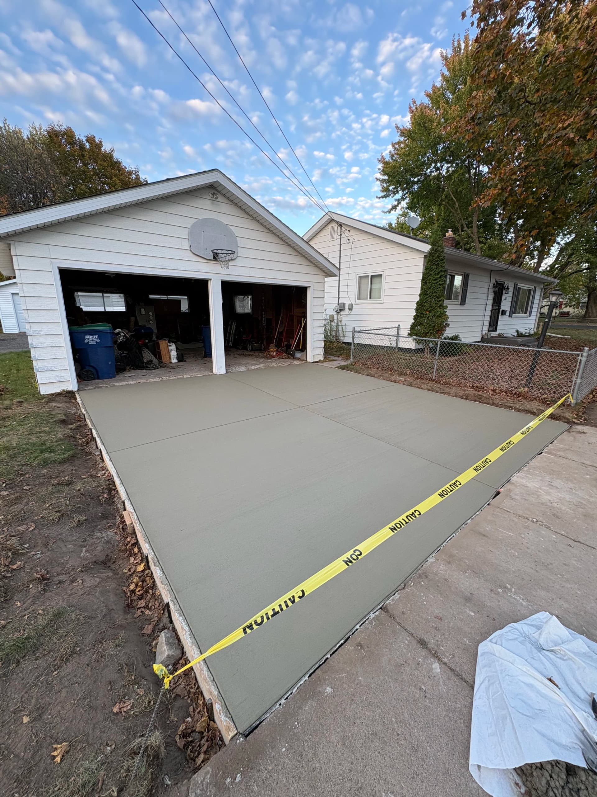 Gallery photos for Crumbling Garage Approach Gets a Fresh Concrete Driveway Replacement: Image #3